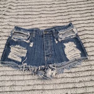 Overly distressed Carmar jean shorts size 28